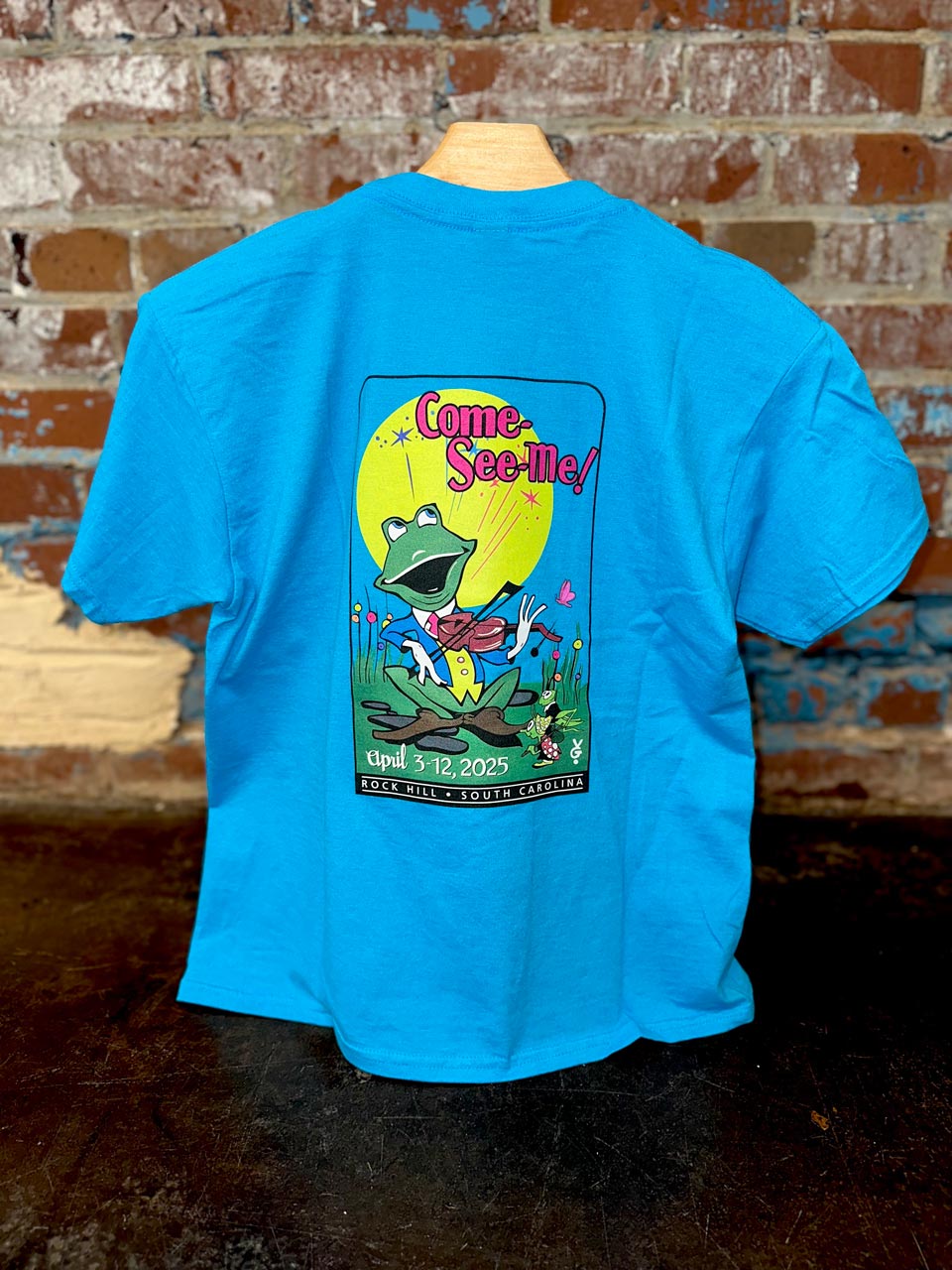 Come-See-Me-Festival-Souveniers-T-Shirts-Youth-Blue-Back